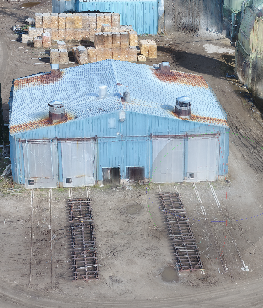 Photorealistic 3D mesh model of an industrial building created from drone photogrammetry